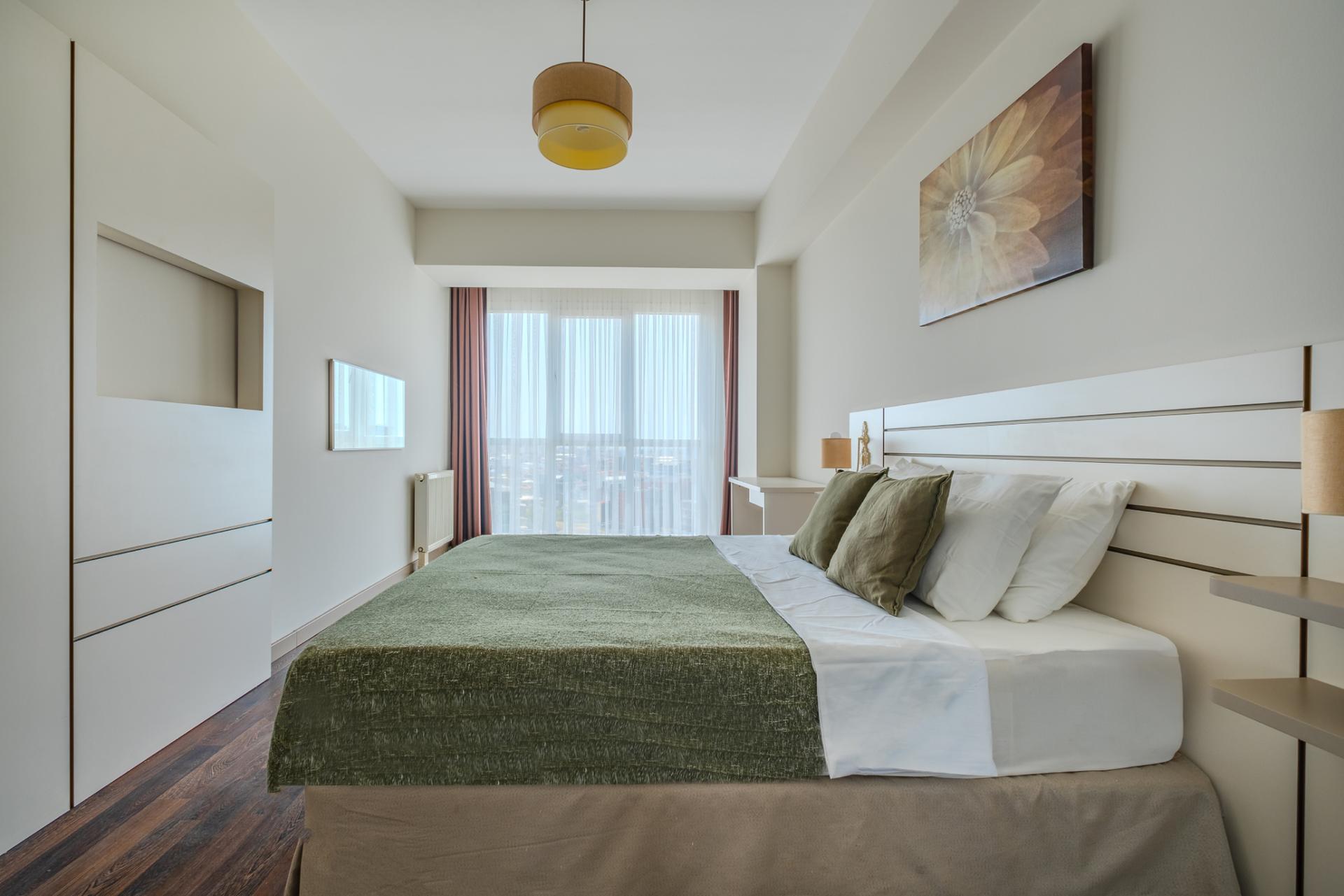 Experience ultimate comfort in our well-appointed bedroom with a queen-sized double bed.