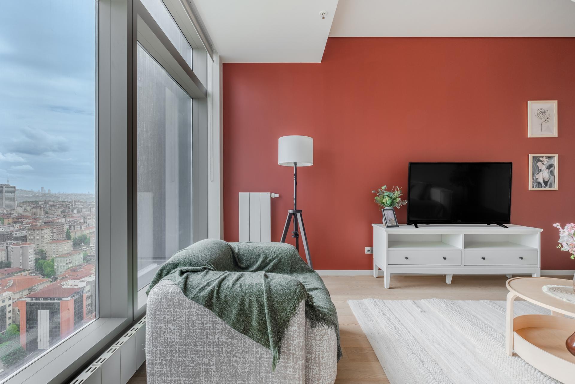 Stylish living room adorned with contemporary art and sleek furniture.