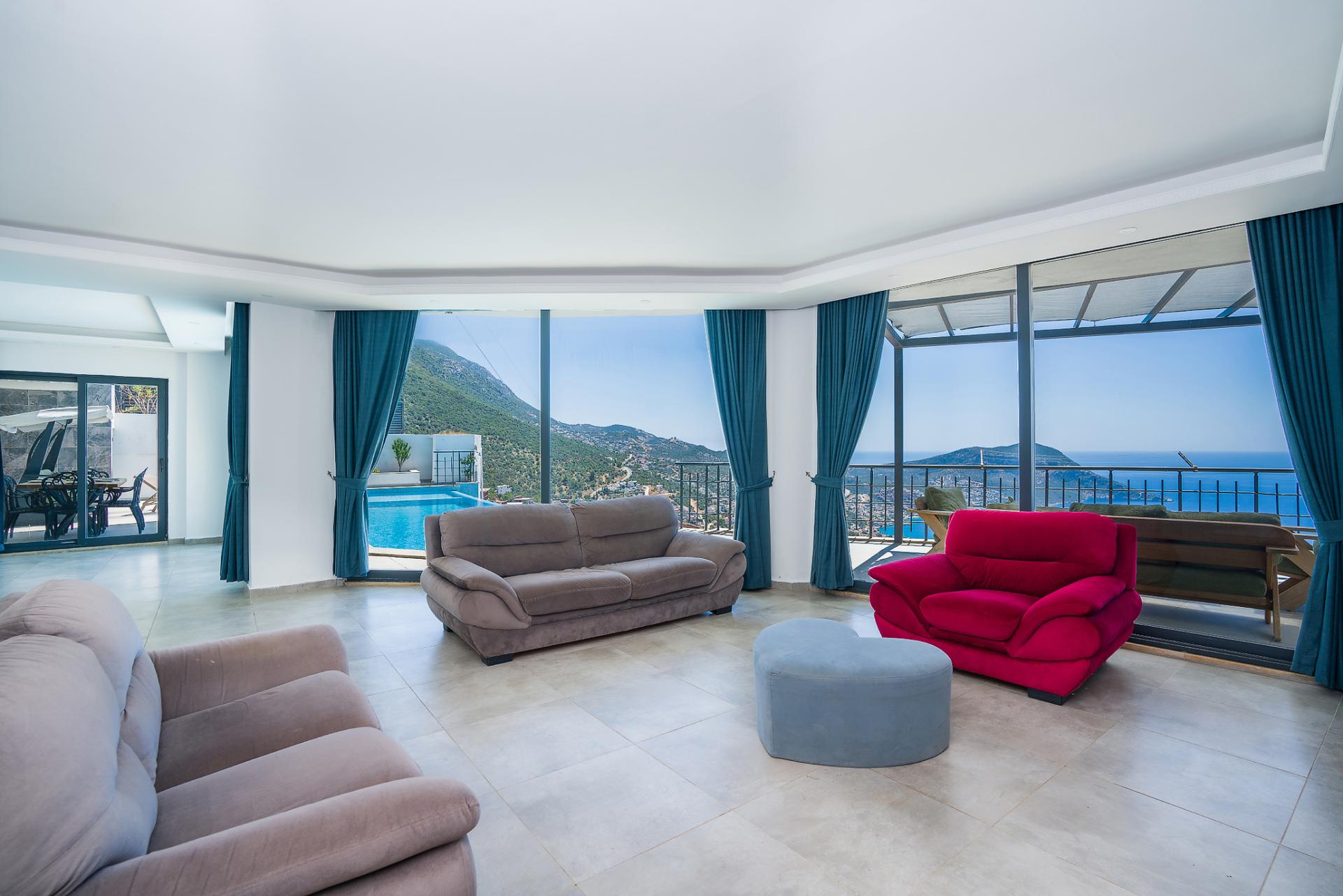 Relax in our living room with breathtaking sea views, a tranquil haven for unwinding.