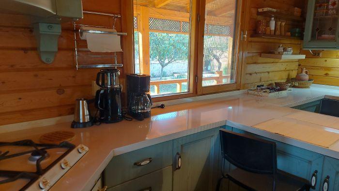 Prepare meals in this classic kitchen, offering a blend of traditional charm and modern conveniences.